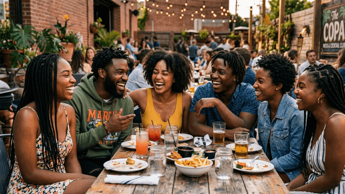 Friends laughing together around a table